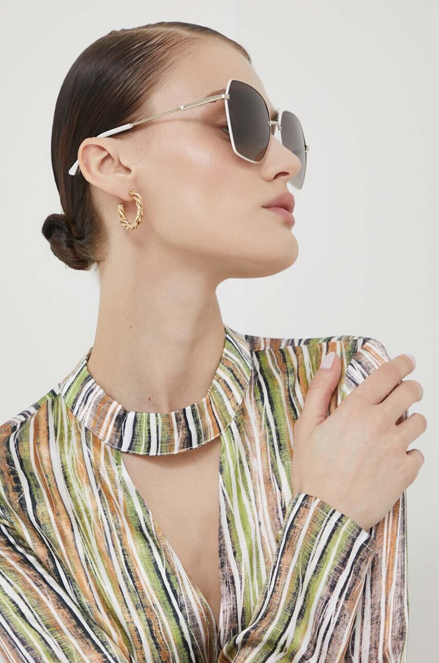 

Солнцезащитные очки Guess женские цвет бежевый