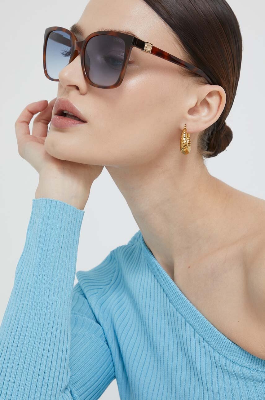 

Солнцезащитные очки Guess женские цвет коричневый