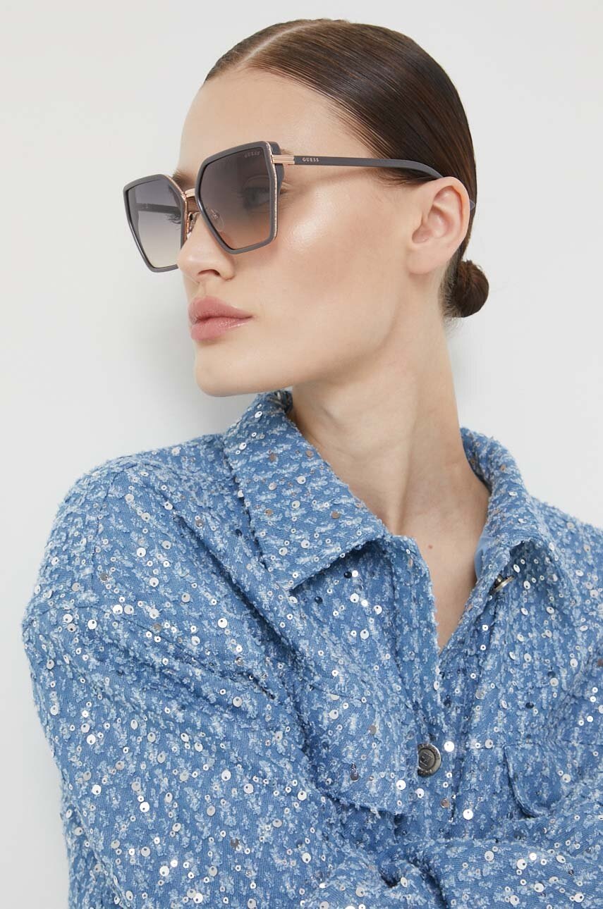 

Солнцезащитные очки Guess женские цвет коричневый