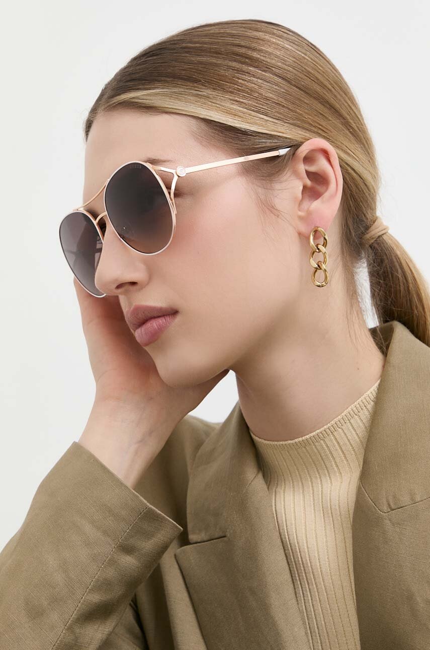 

Солнцезащитные очки Guess женские цвет белый