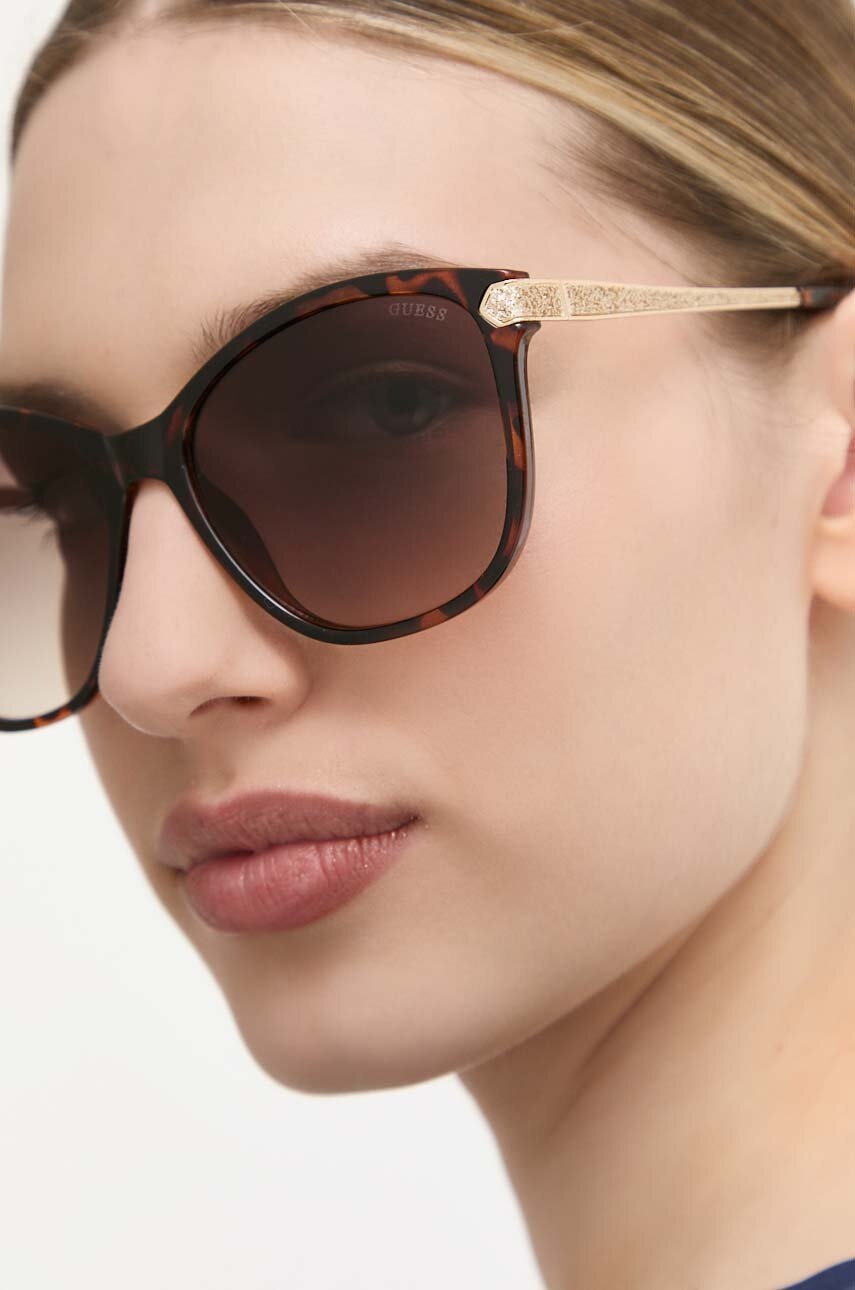 

Солнцезащитные очки Guess женские цвет коричневый