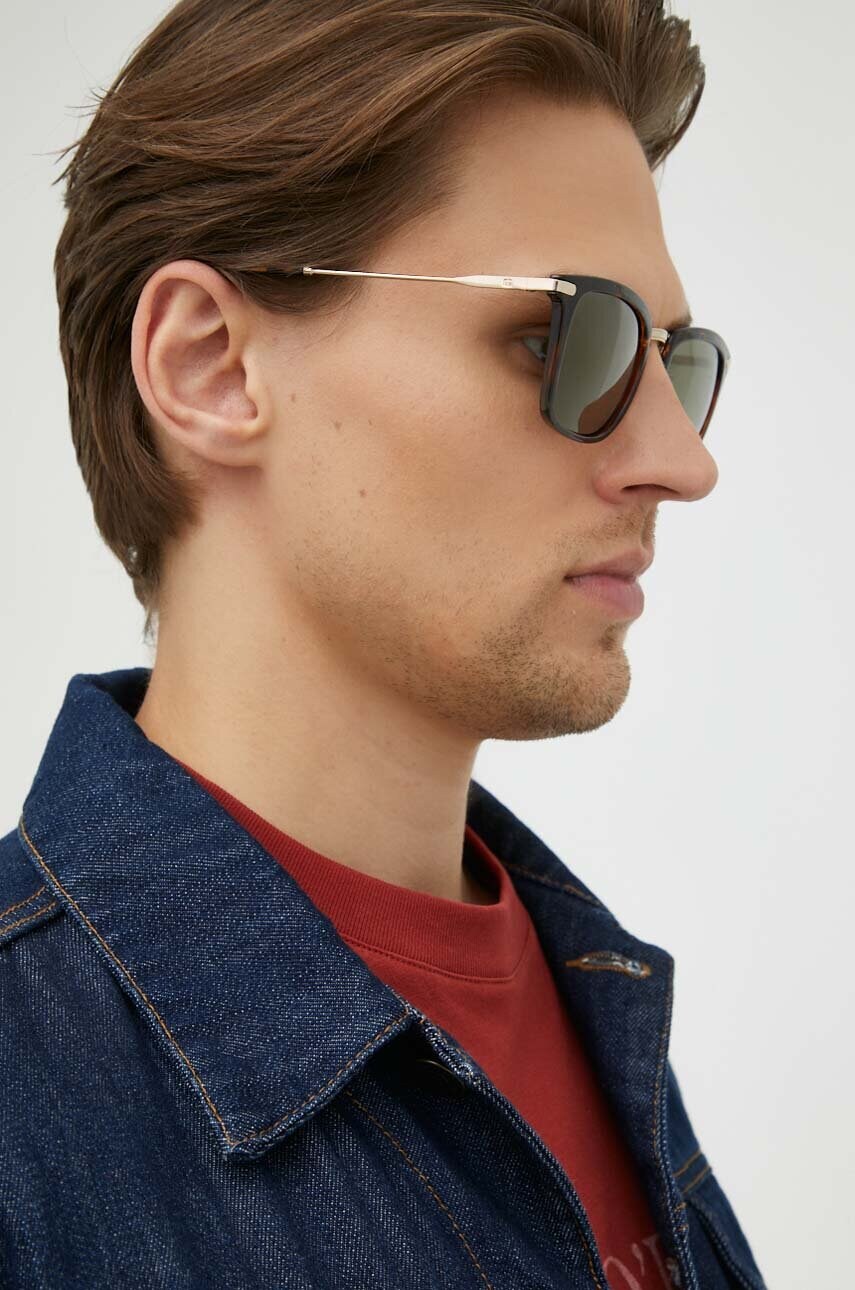 

Солнцезащитные очки Guess мужские цвет коричневый