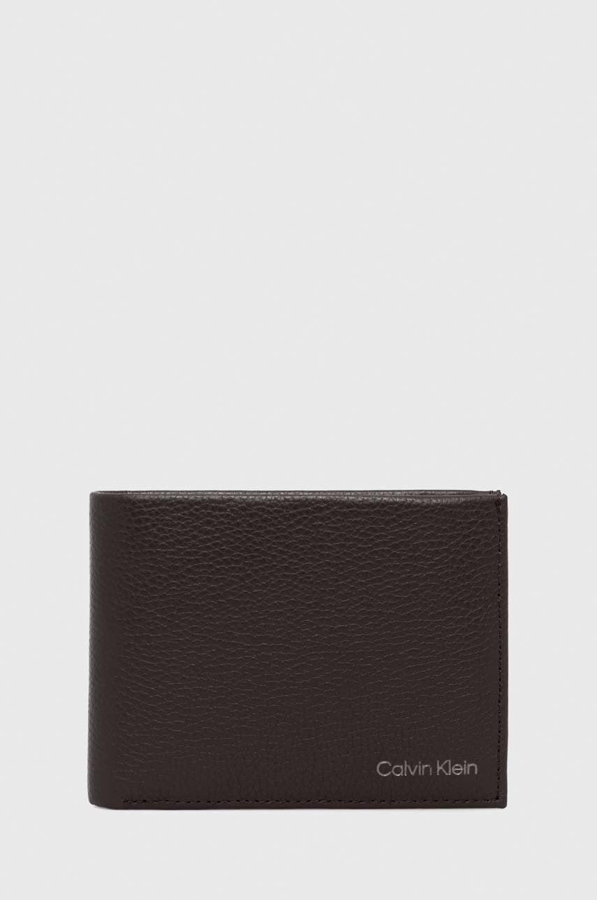 Levně Kožená peněženka Calvin Klein hnědá barva, K50K507896