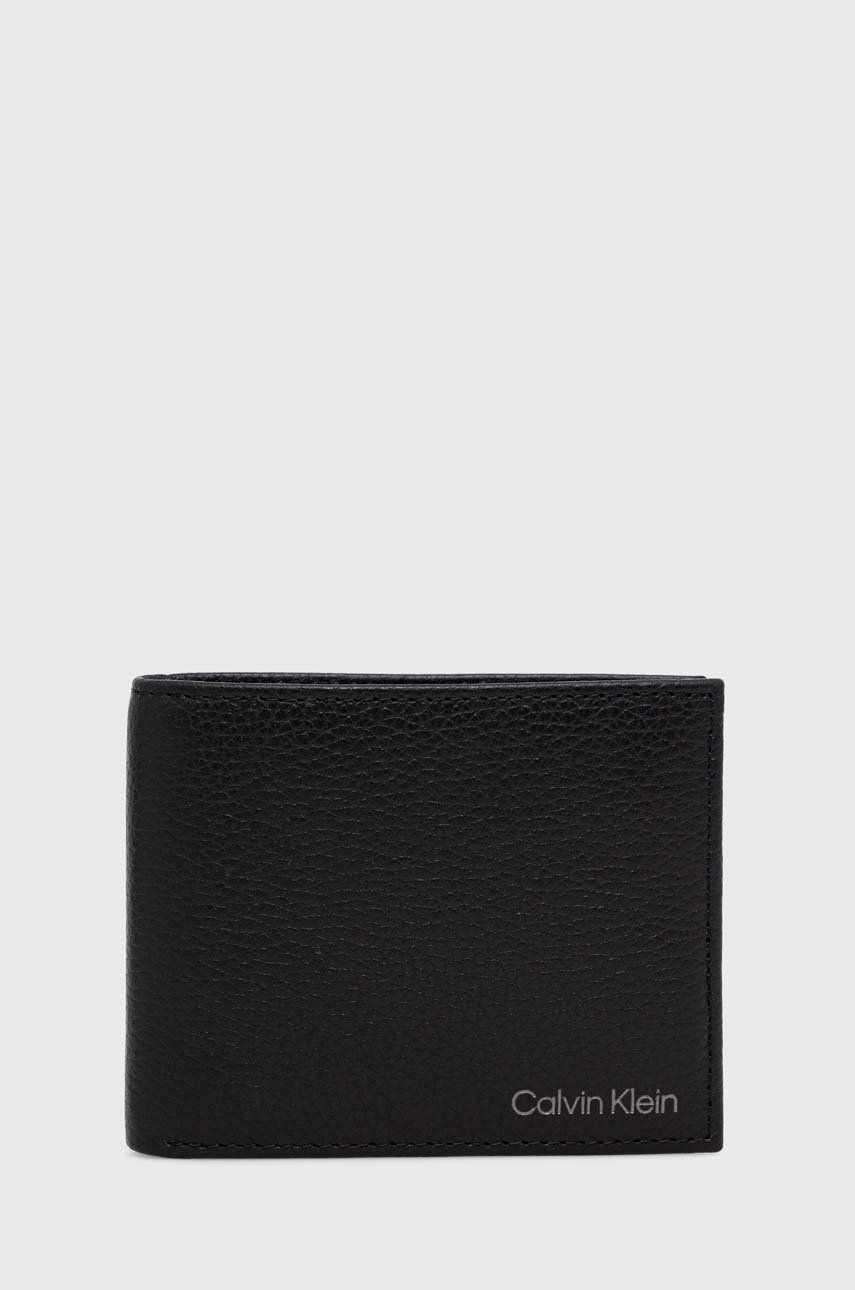 Levně Kožená peněženka Calvin Klein černá barva, K50K509994