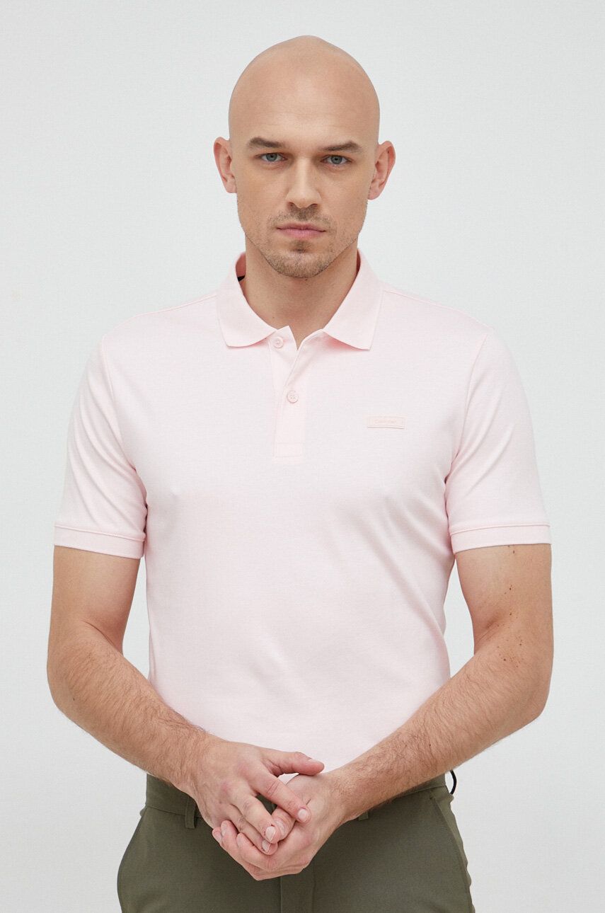 Levně Bavlněné polo tričko Calvin Klein růžová barva, K10K111657