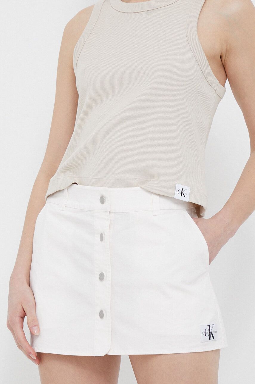 Levně Sukně Calvin Klein Jeans bílá barva, mini