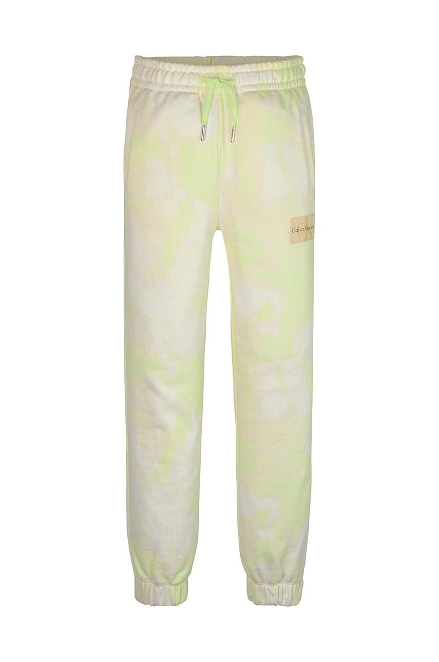 E-shop Dětské bavlněné tepláky Calvin Klein Jeans zelená barva