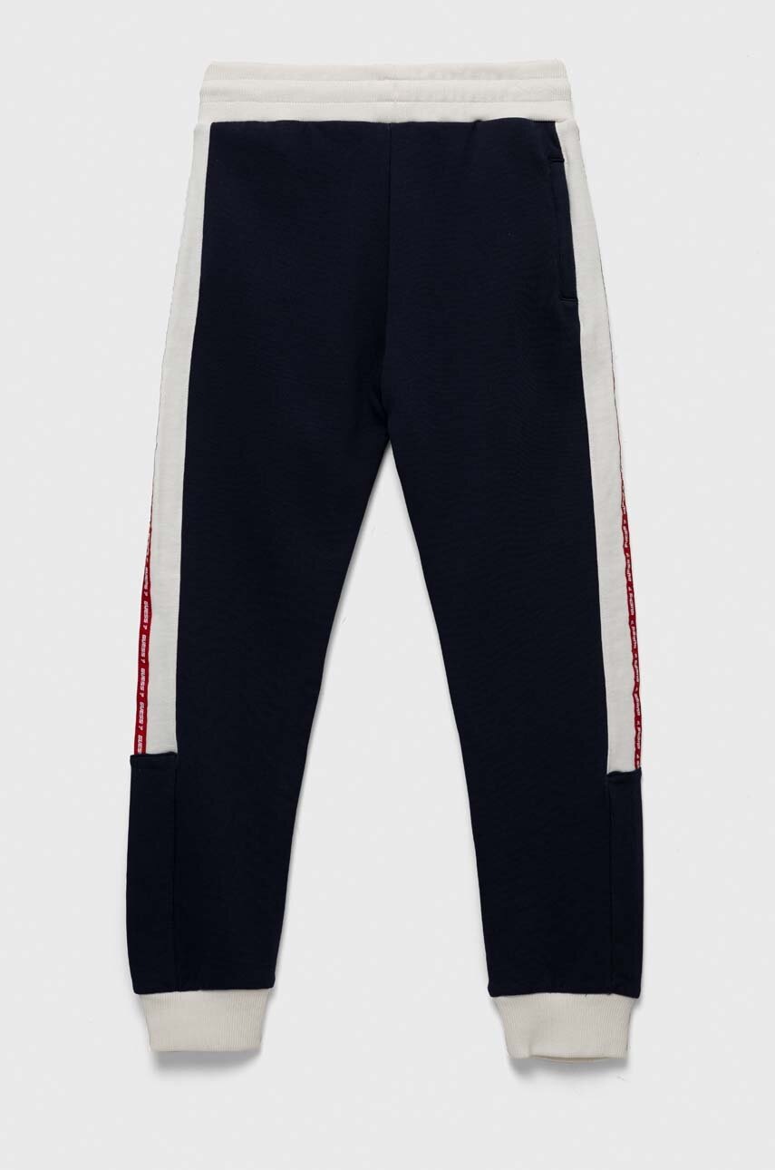 Хлопковые спортивные штаны Guess цвет синий с аппликацией Хлопковые спортивные штаны Guess цвет синий с аппликацией