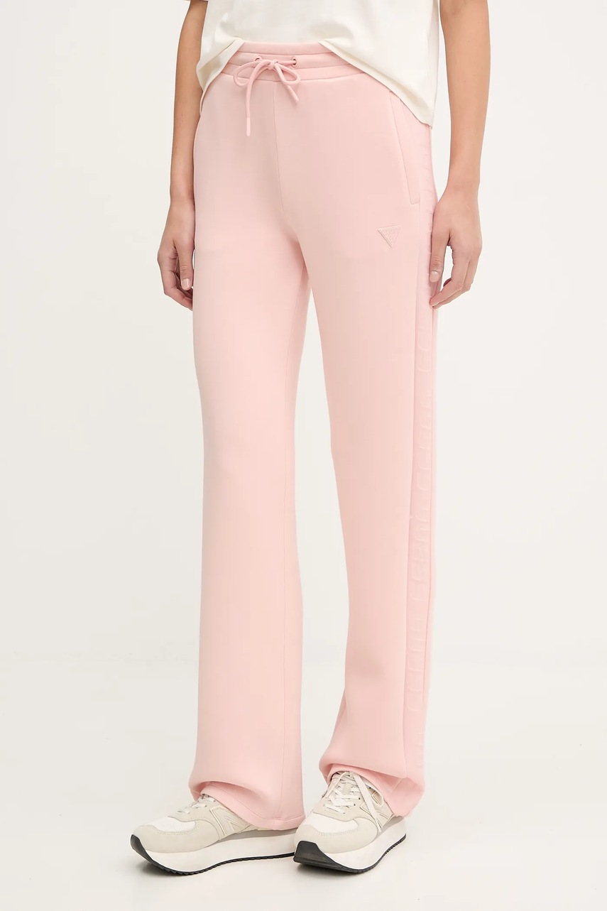 Levně Tepláky Guess červená barva, s potiskem