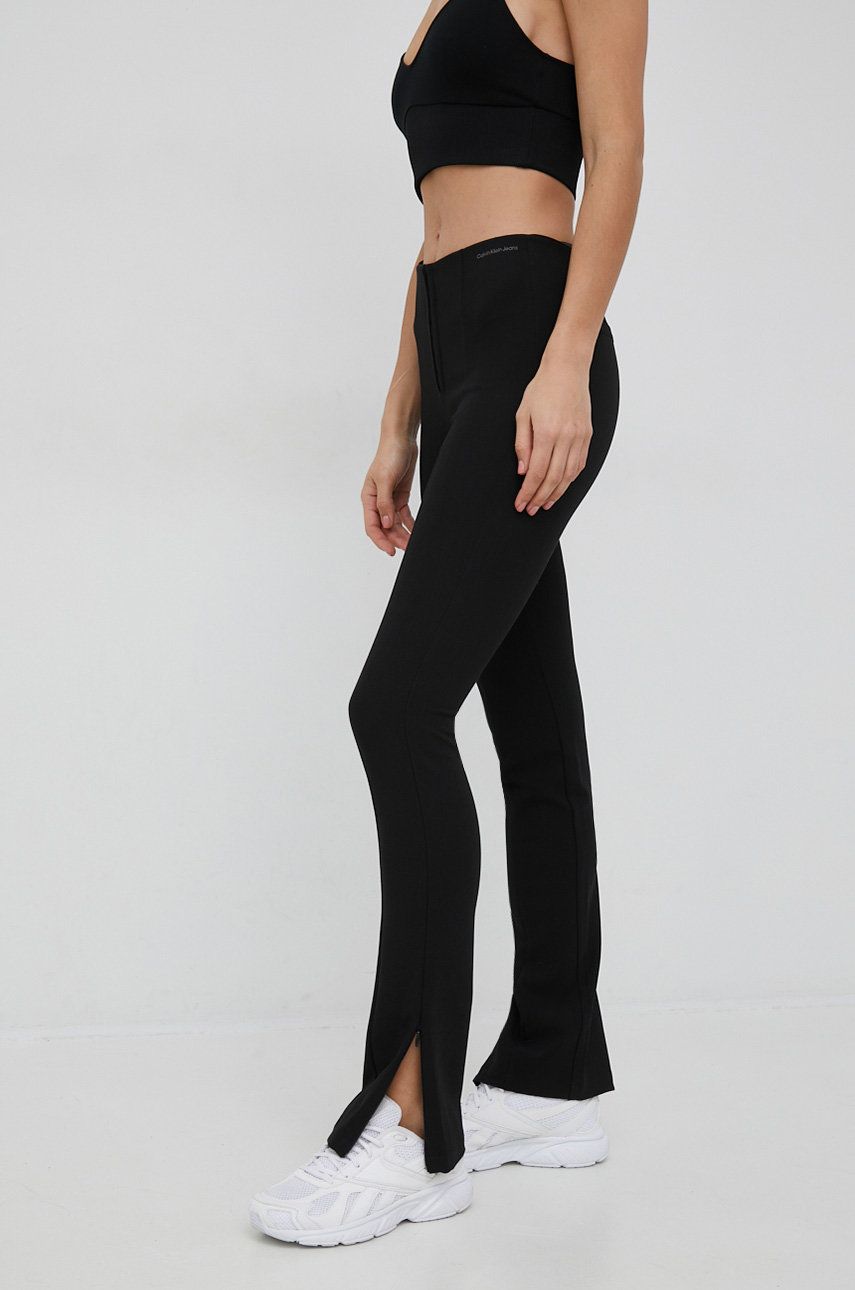 Kalhoty Calvin Klein Jeans dámské, černá barva, jednoduché, high waist - černá -  82% Polyester