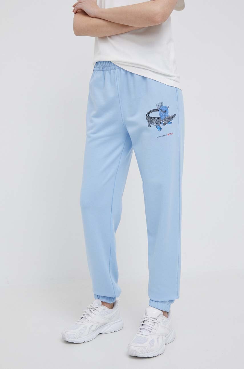 

Хлопковые спортивные штаны Lacoste x Netflix с принтом
