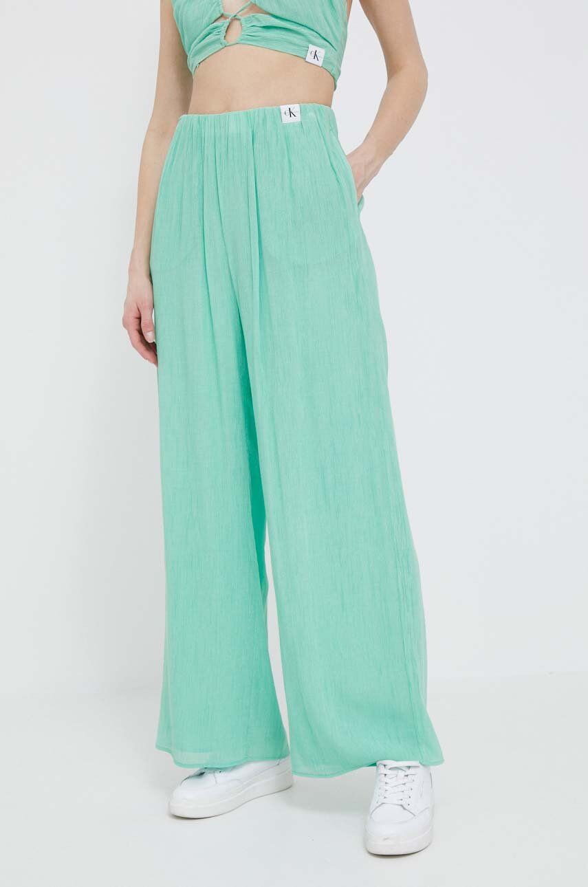 Levně Kalhoty Calvin Klein Jeans dámské, zelená barva, široké, high waist