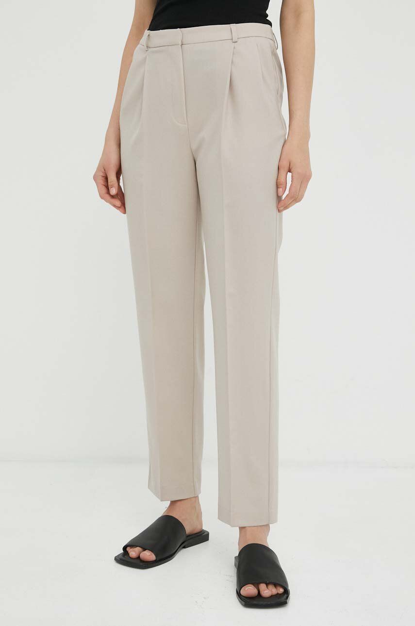 Kalhoty s příměsí vlny Herskind Brandy béžová barva, jednoduché, high waist - béžová -  Hlavní 