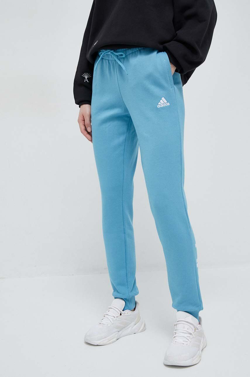 Bavlněné tepláky adidas s potiskem - modrá -  100 % Bavlna