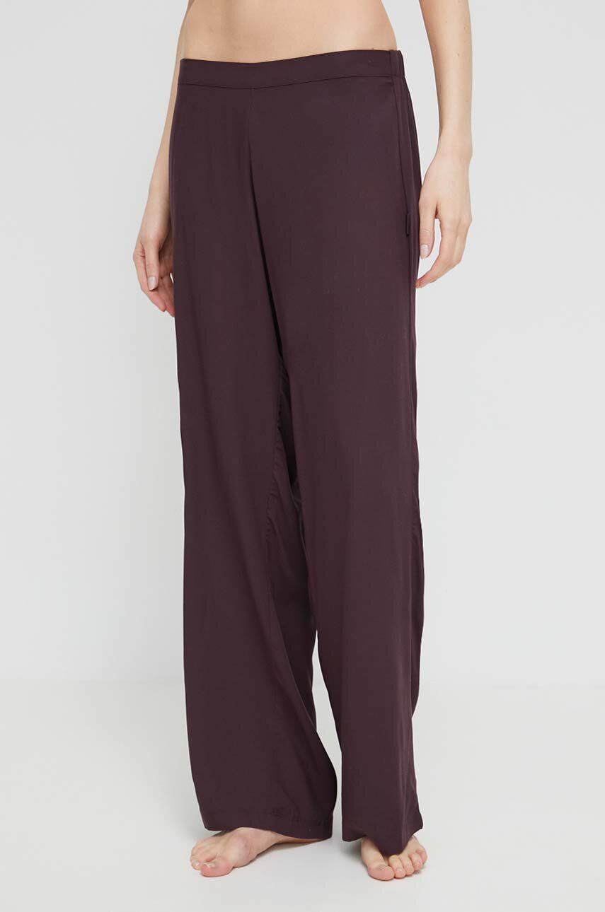 Pyžamové kalhoty Calvin Klein Underwear dámské, fialová barva - fialová -  100 % Viskóza