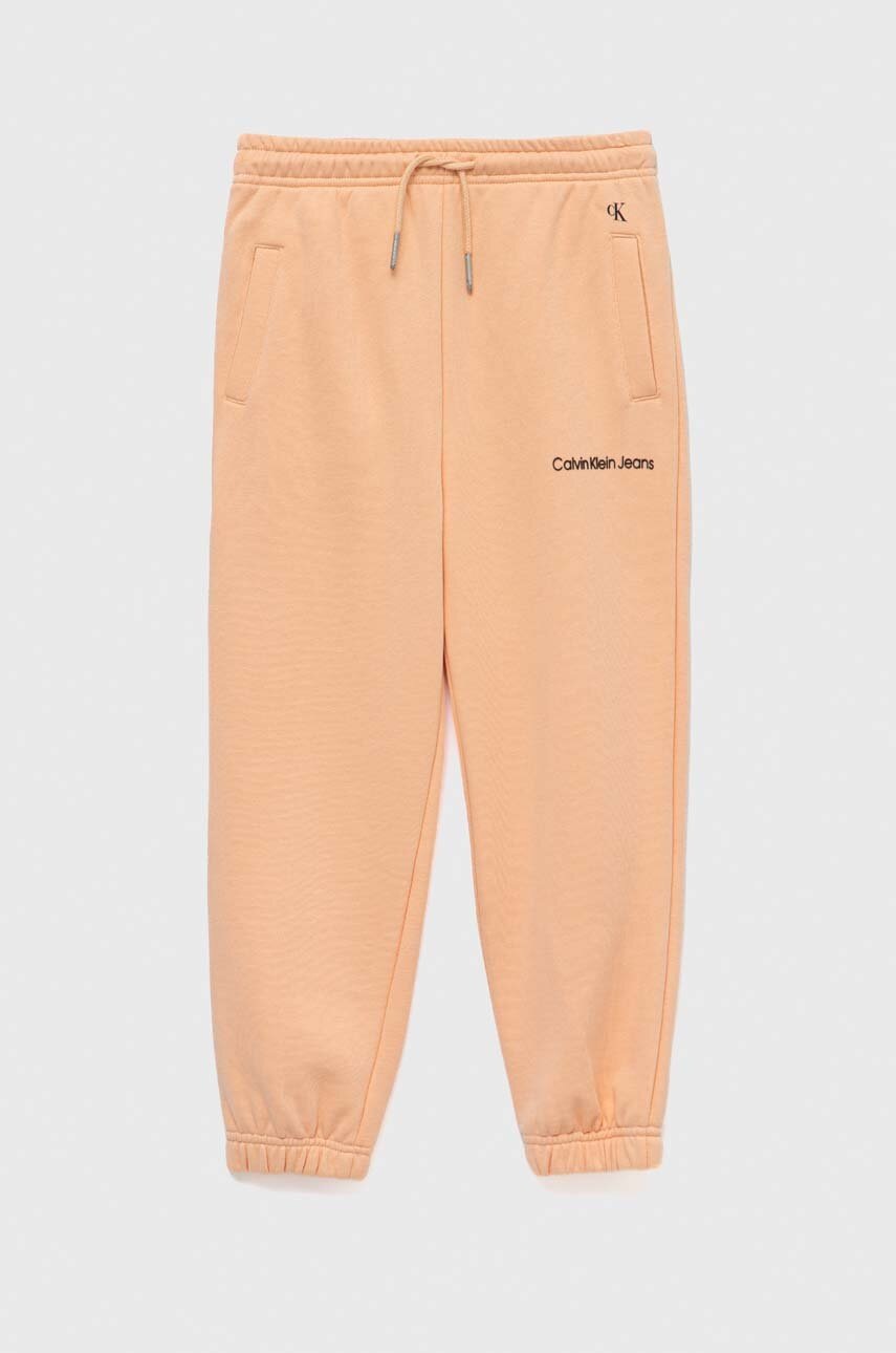 Детские спортивные штаны Calvin Klein Jeans цвет оранжевый однотонные