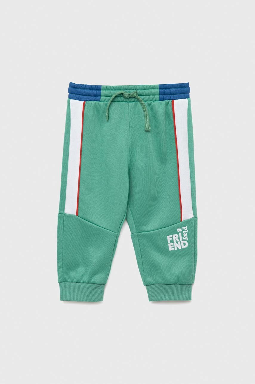 

Дитячі спортивні штани United Colors of Benetton колір зелений візерунок