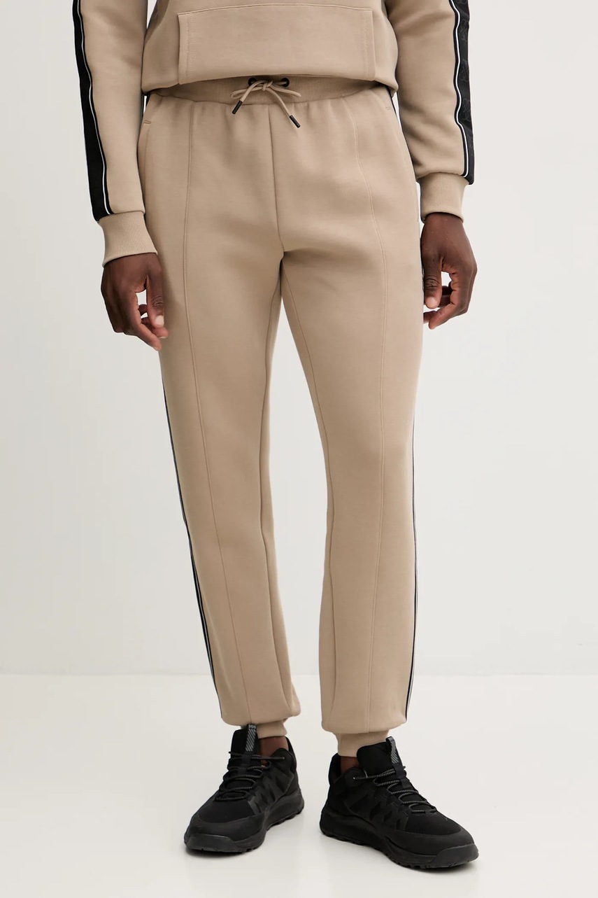 Levně Tepláky Guess MICKEY hnědá barva, s potiskem, Z2YB09 KB3P2