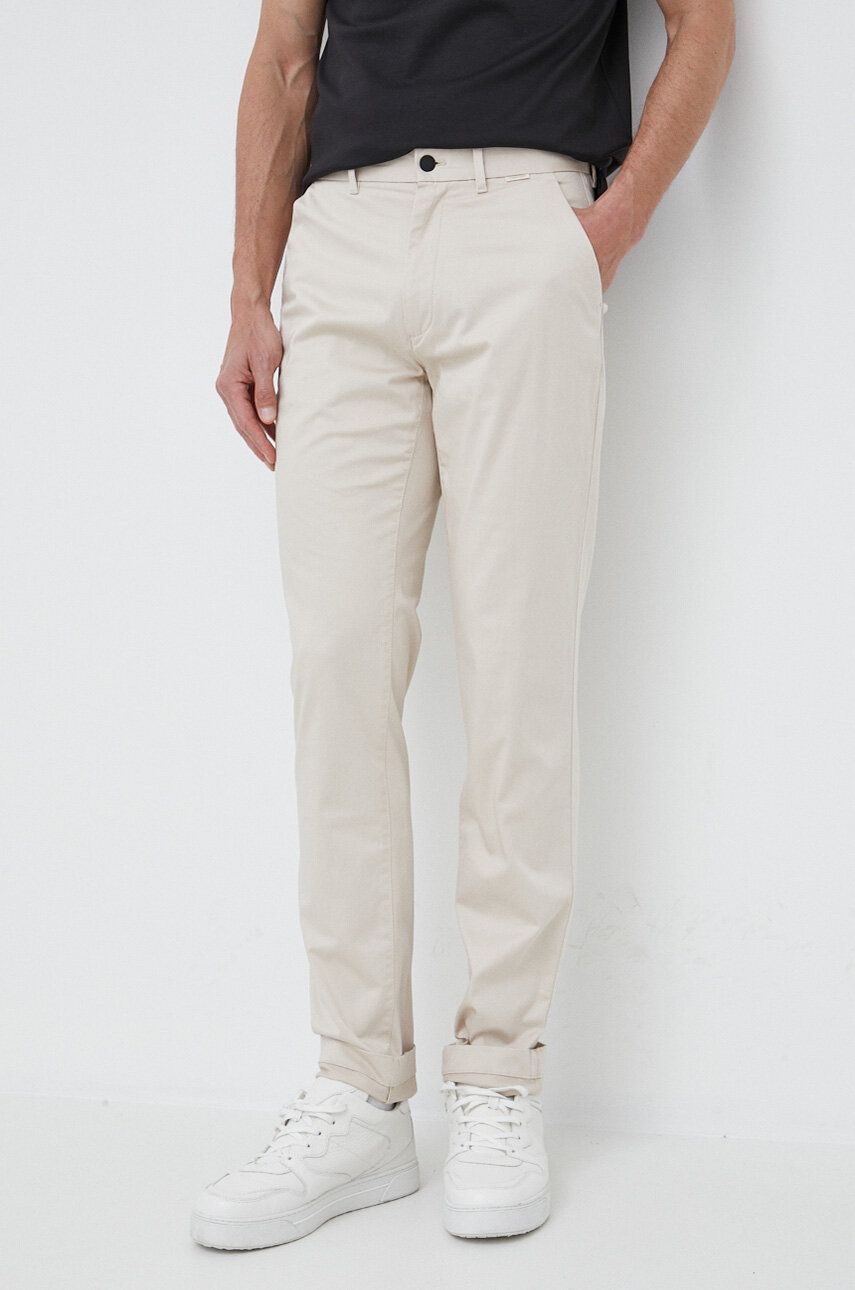 Levně Kalhoty Calvin Klein pánské, béžová barva, přiléhavé, K10K110963
