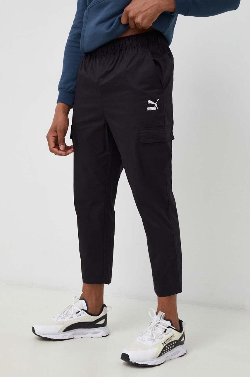 

Брюки Puma мужские цвет чёрный с принтом