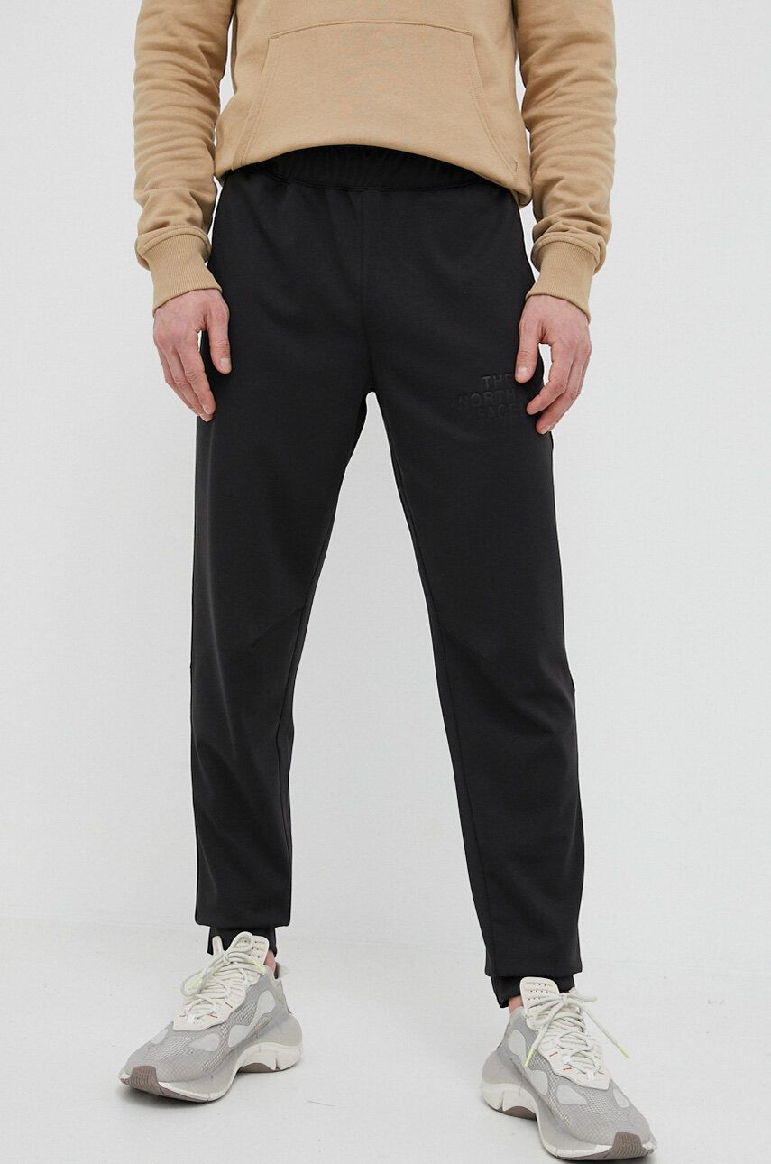 The North Face pantaloni de trening culoarea negru, neted