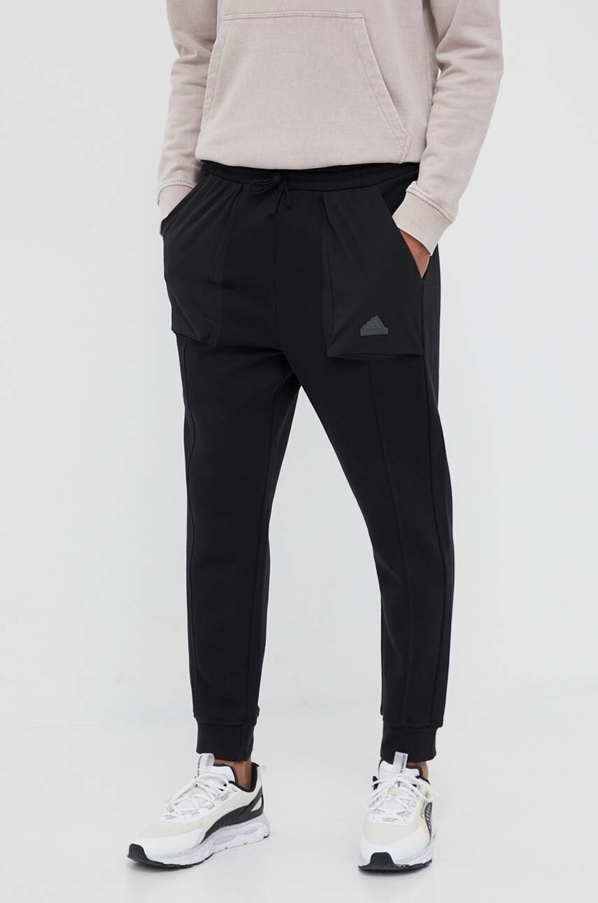 

Спортивні штани adidas колір чорний однотонні