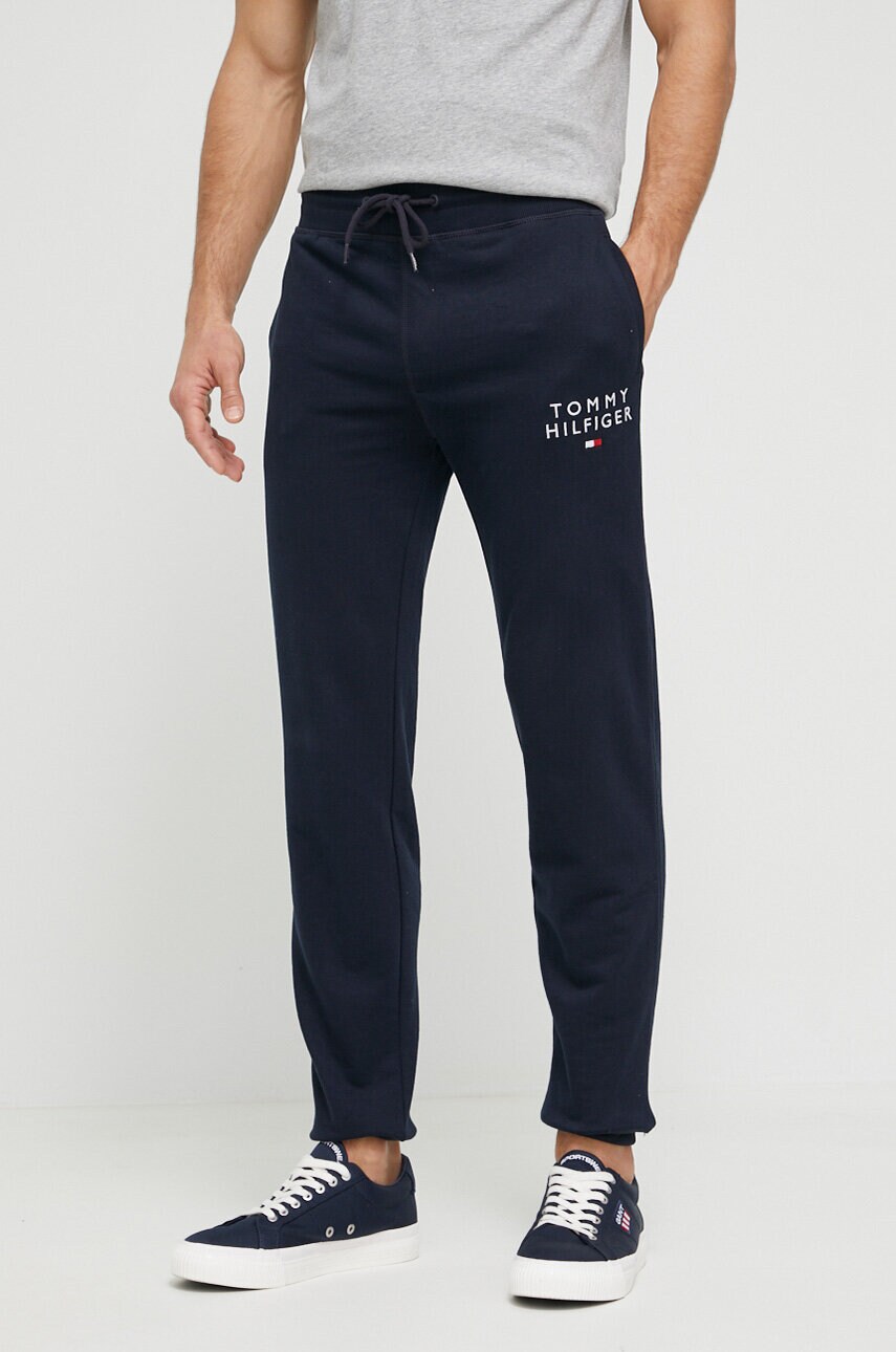 Levně Tepláky Tommy Hilfiger tmavomodrá barva, melanžové, UM0UM02880