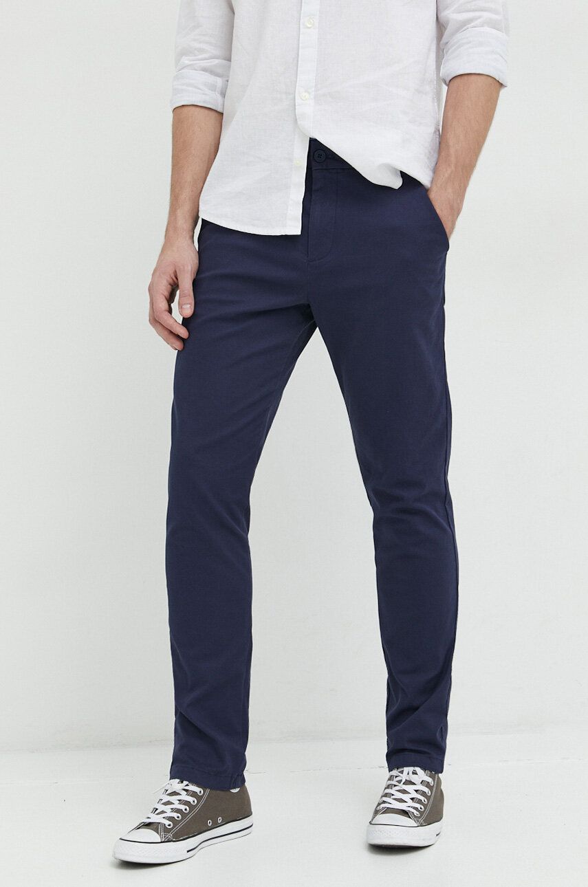 Tommy Jeans pantaloni barbati, culoarea albastru marin, mulata