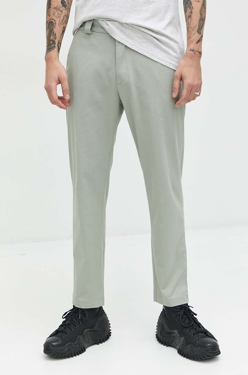 Tommy Jeans pantaloni barbati, culoarea verde, cu fason chinos