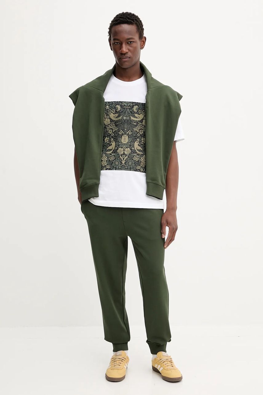 Хлопковые спортивные штаны HUGO цвет чёрный однотонные 50489617