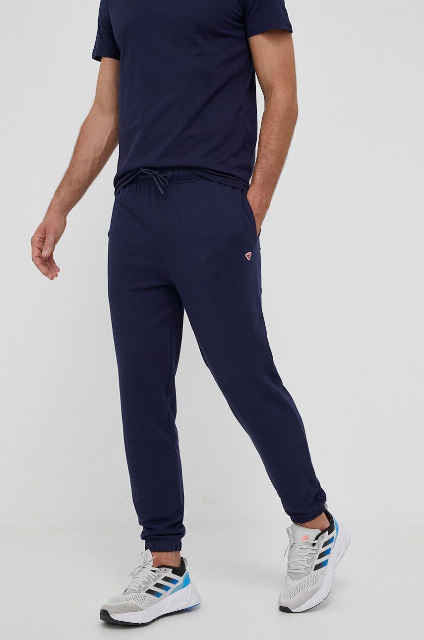 Hummel pantaloni de trening din bumbac culoarea albastru marin, cu imprimeu