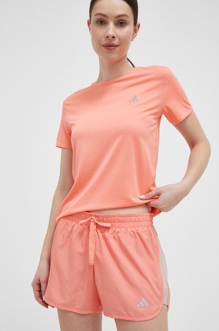 Levně Běžecké šortky adidas Performance Run It oranžová barva, s potiskem, medium waist