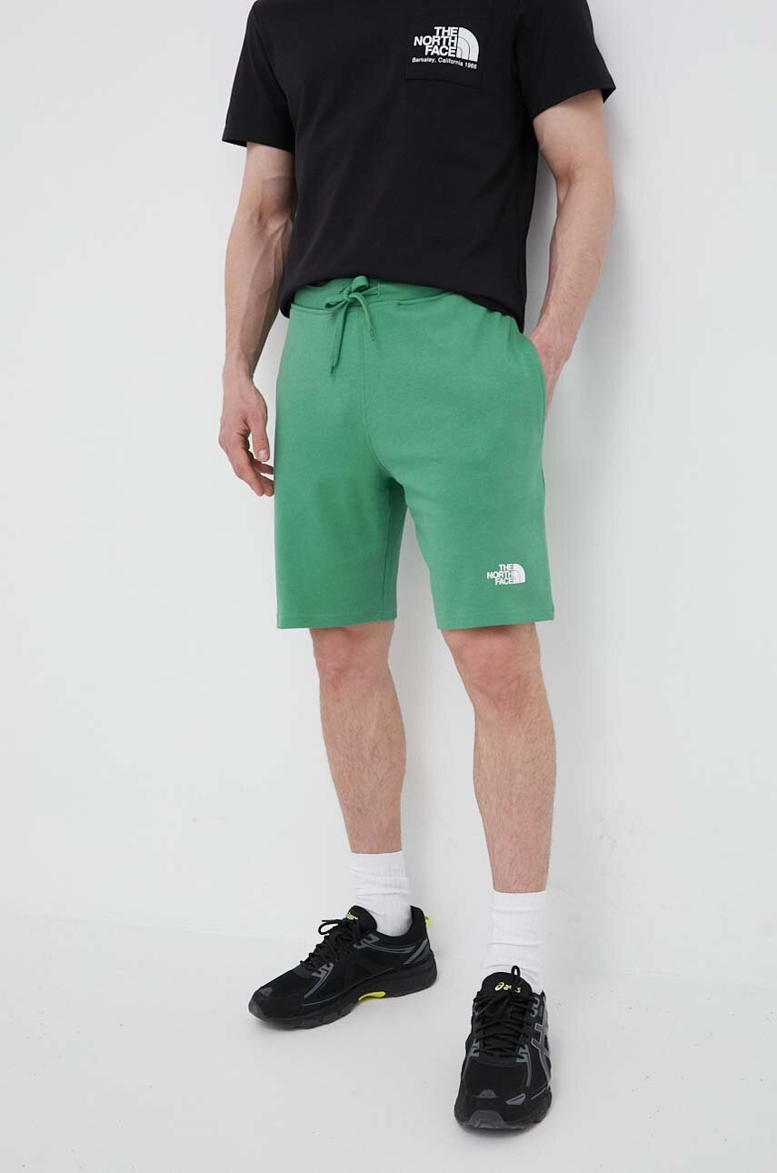 

Бавовняні шорти The North Face колір зелений