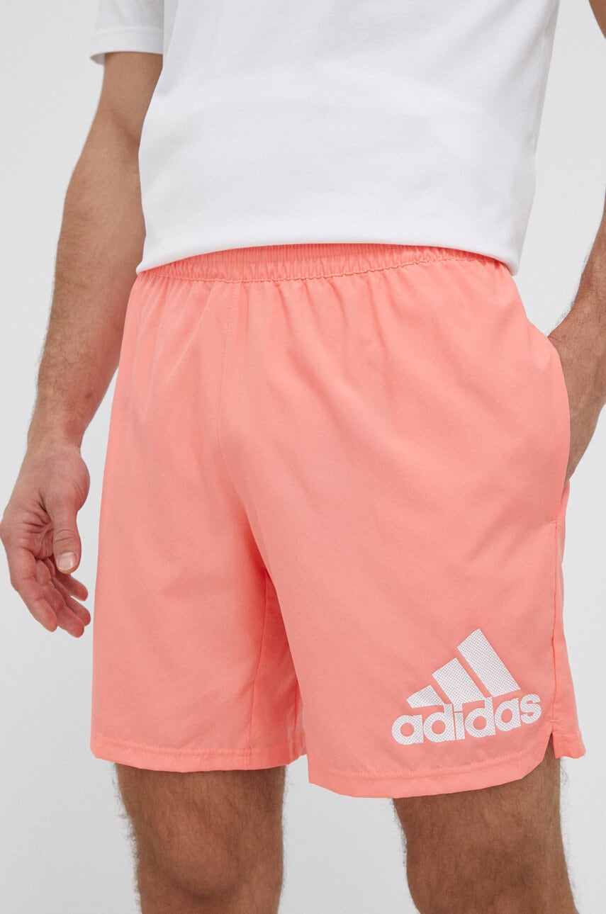 Levně Běžecké šortky adidas Performance Run It oranžová barva