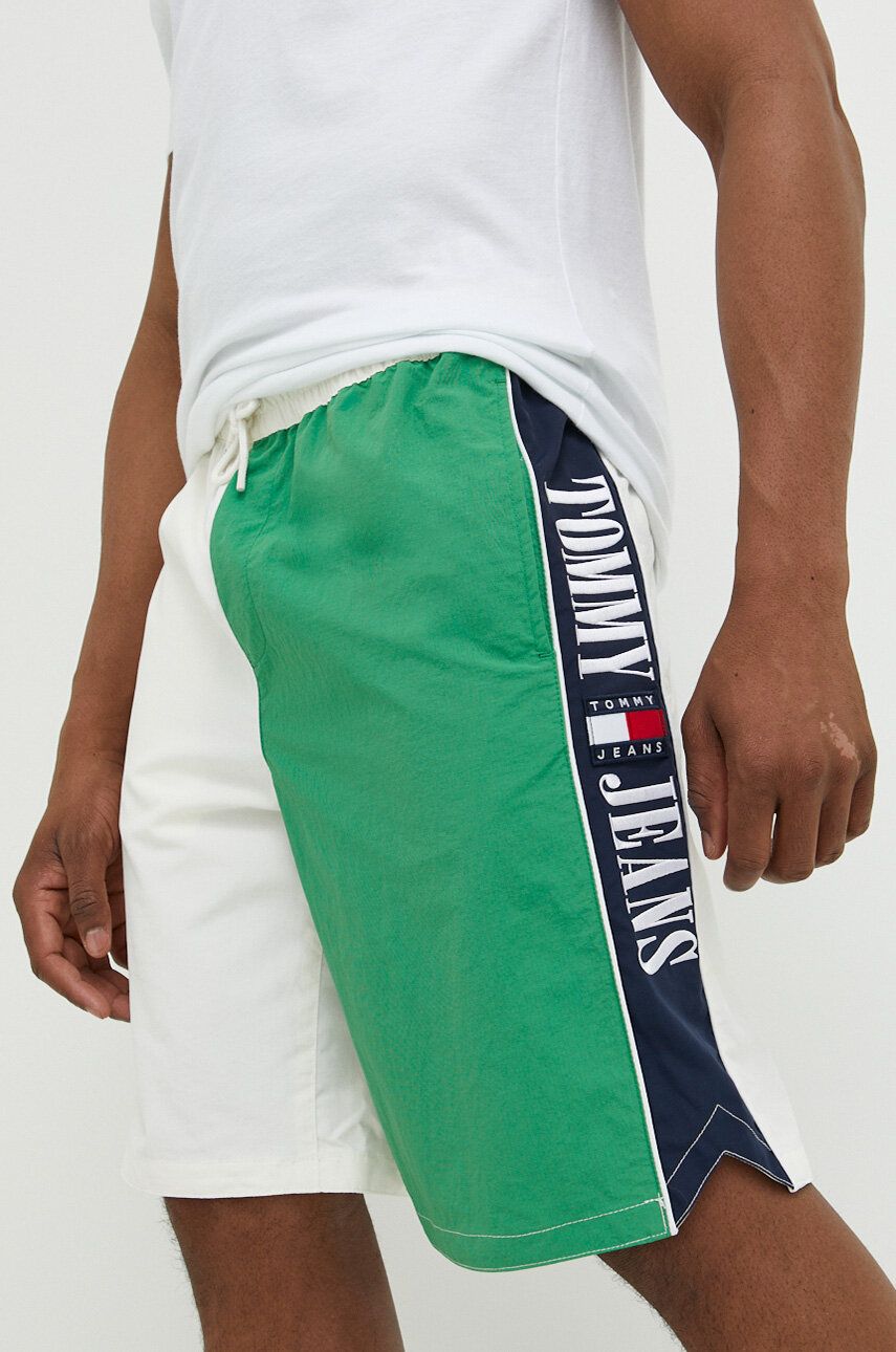 Kraťasy Tommy Jeans pánské, zelená barva - zelená -  100 % Polyamid