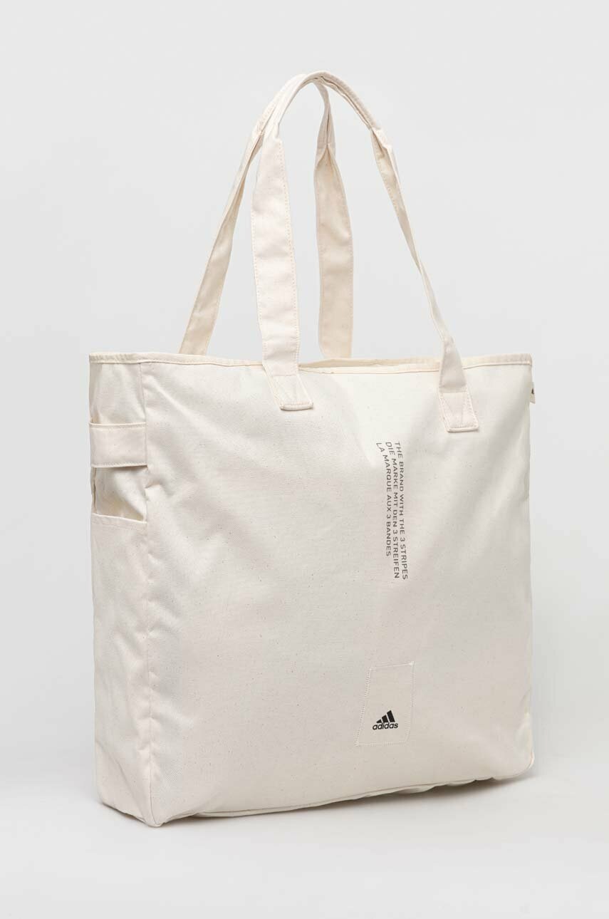 

Сумочка adidas колір бежевий