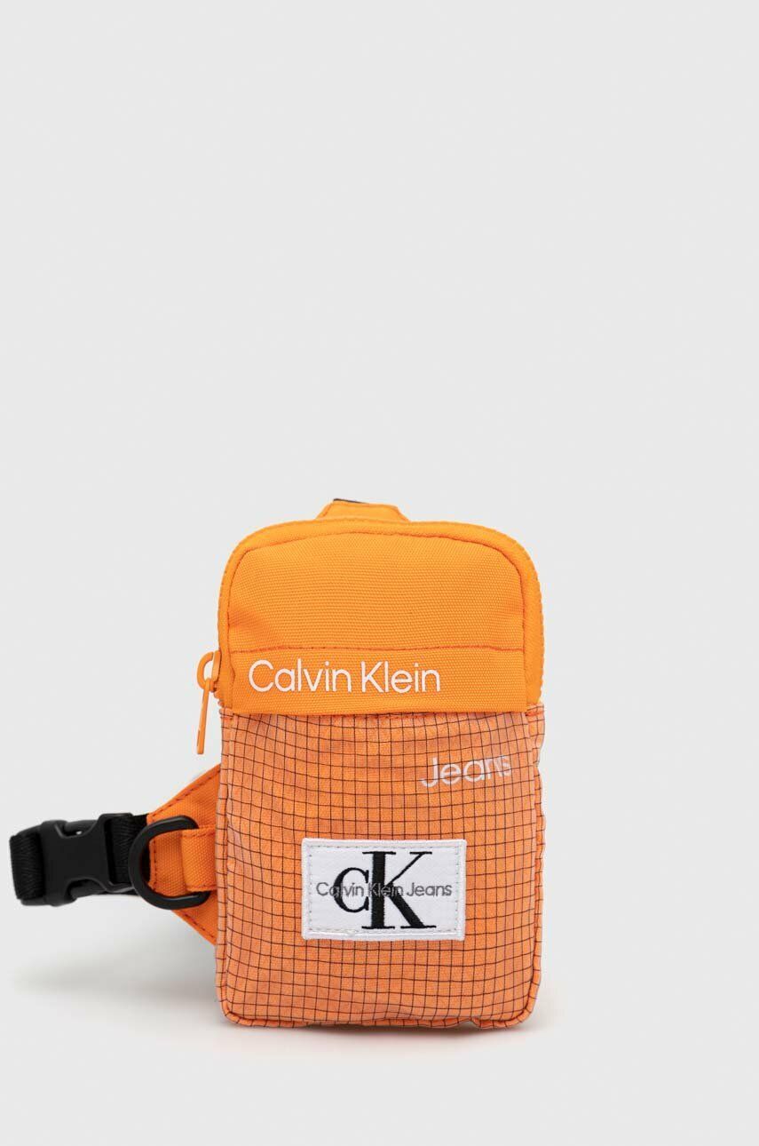 Ledvinka Calvin Klein Jeans oranžová barva - oranžová -  80 % Polyester