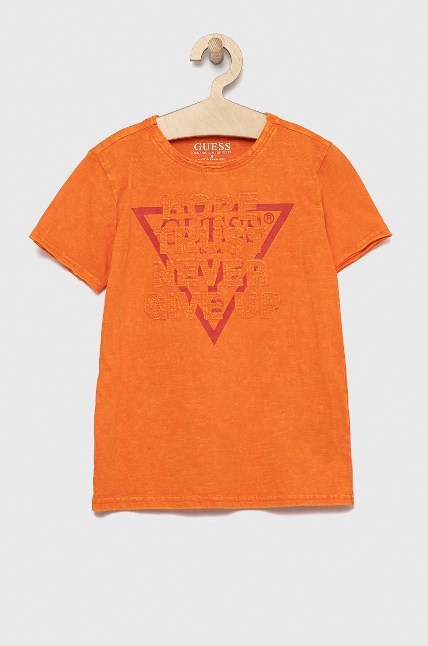 

Детская хлопковая футболка Guess цвет оранжевый с принтом
