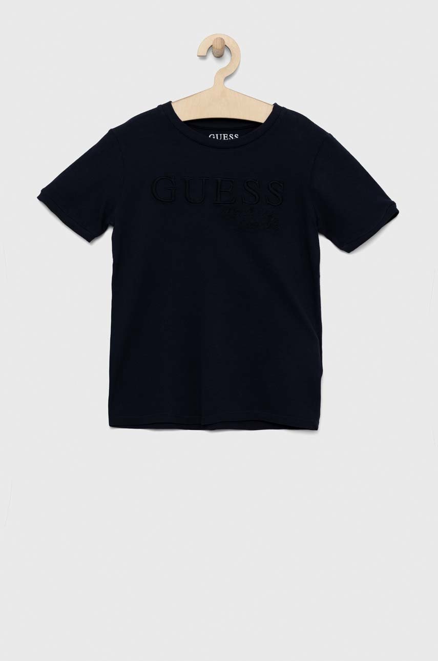 

Дитяча бавовняна футболка Guess колір синій з аплікацією