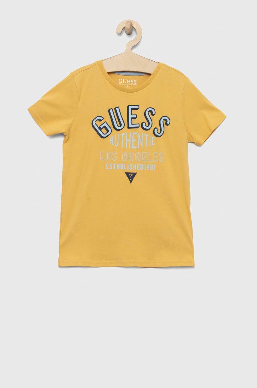 Dětské bavlněné tričko Guess žlutá barva, s potiskem - žlutá -  100 % Bavlna