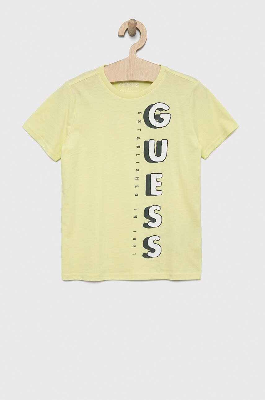 

Дитяча бавовняна футболка Guess колір зелений з принтом