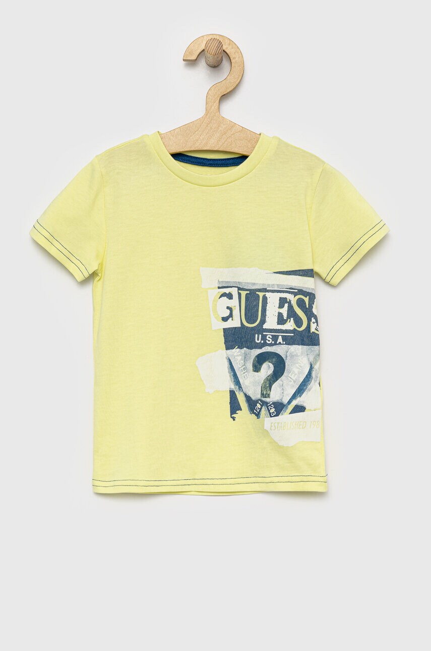 

Дитяча бавовняна футболка Guess колір жовтий з принтом