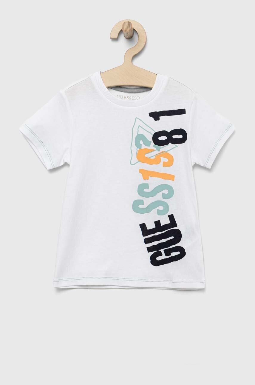 

Дитяча бавовняна футболка Guess колір білий з принтом