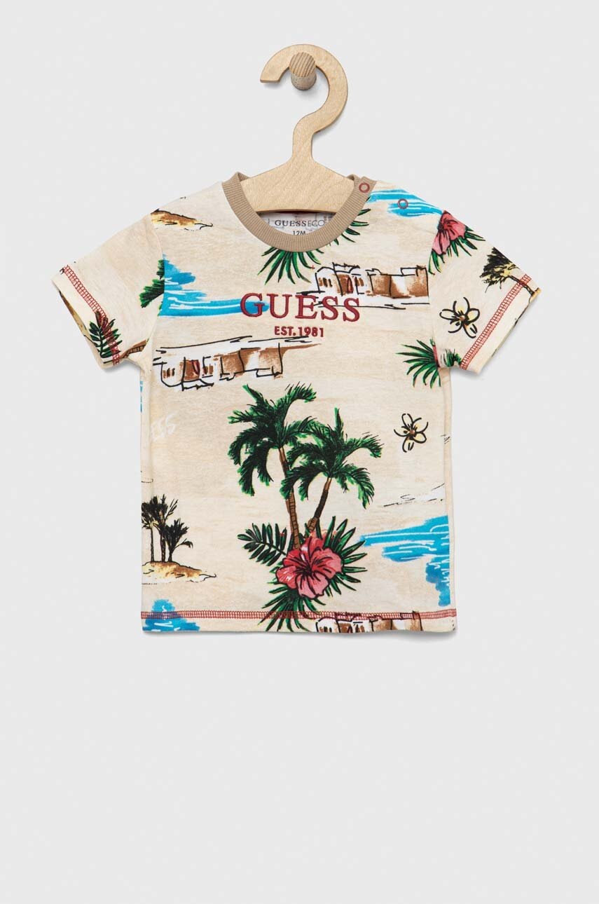 

Дитяча бавовняна футболка Guess колір бежевий візерунок