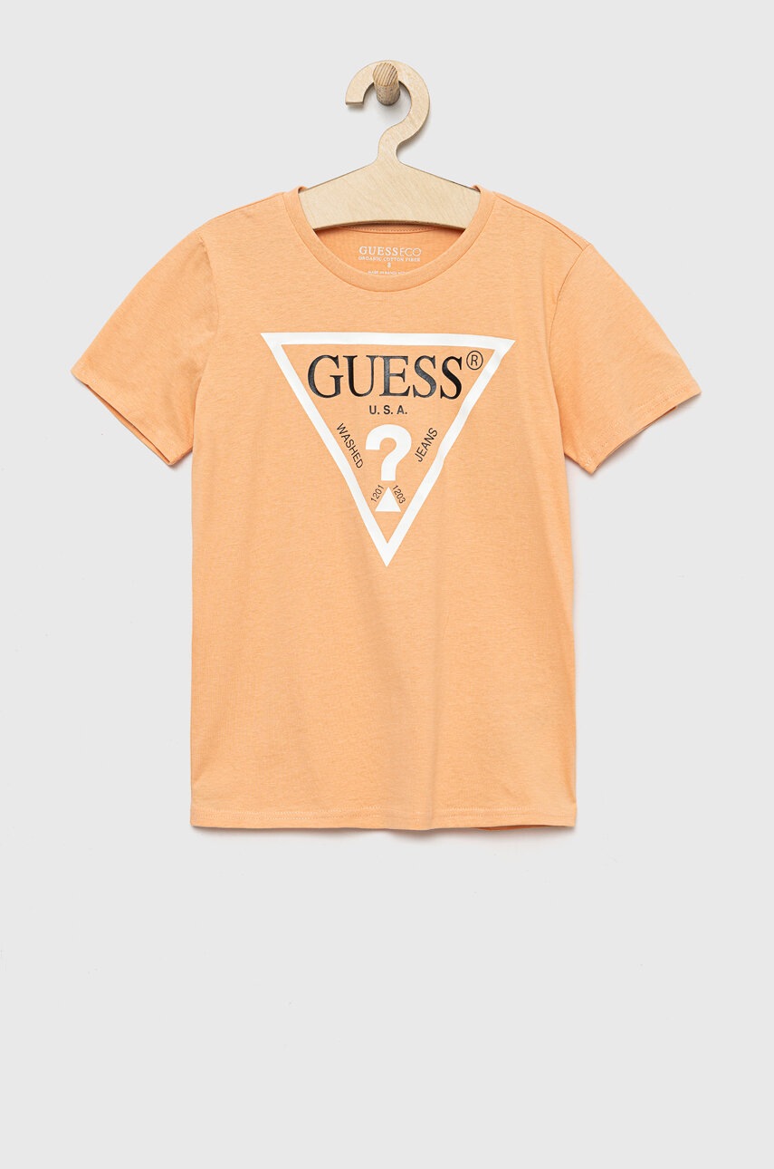 

Детская хлопковая футболка Guess цвет оранжевый с принтом