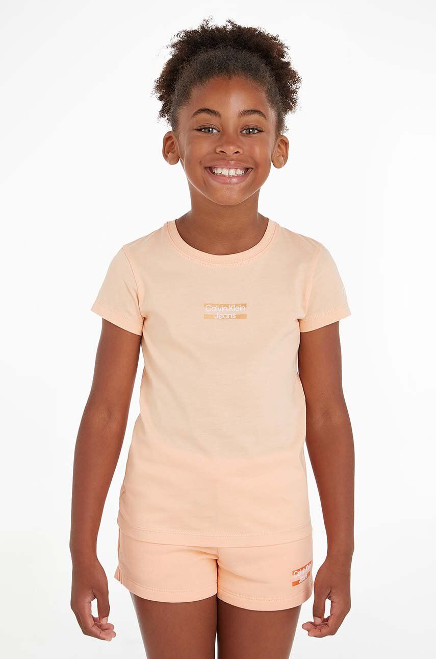 Levně Dětské bavlněné tričko Calvin Klein Jeans oranžová barva