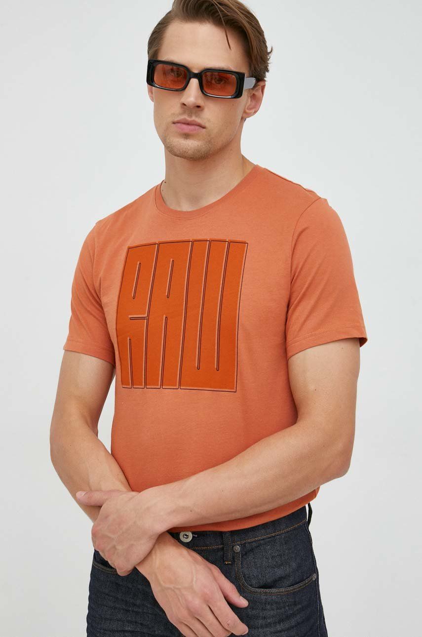 Levně Bavlněné tričko G-Star Raw oranžová barva, s potiskem