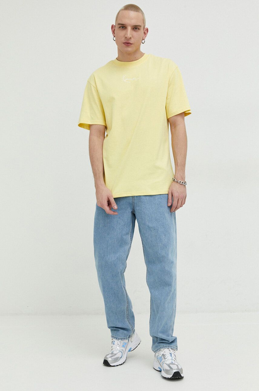 Bavlněné tričko Karl Kani žlutá barva, s aplikací - žlutá -  100 % Bavlna