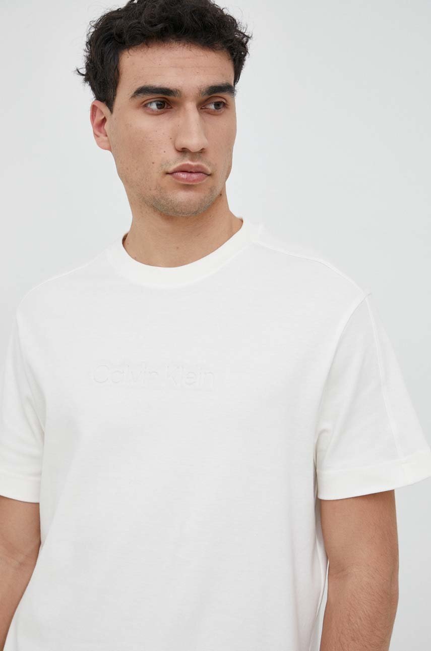 

Памучна тениска Calvin Klein в бежово с апликация, Бежов