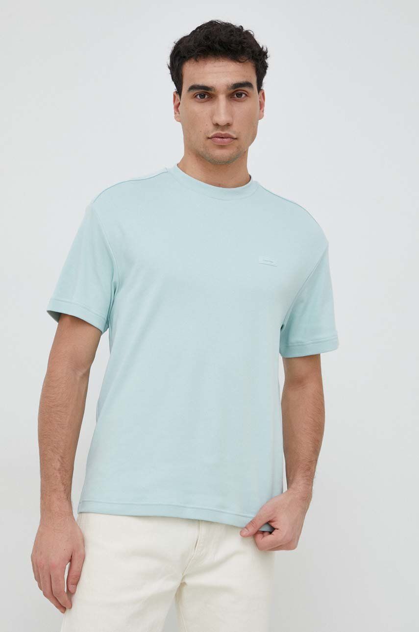 Bavlněné tričko Calvin Klein s aplikací - modrá -  100 % Bavlna